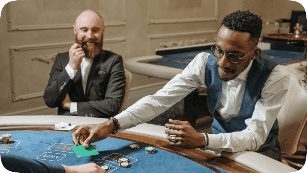 Two men at a casino poker table, gambling